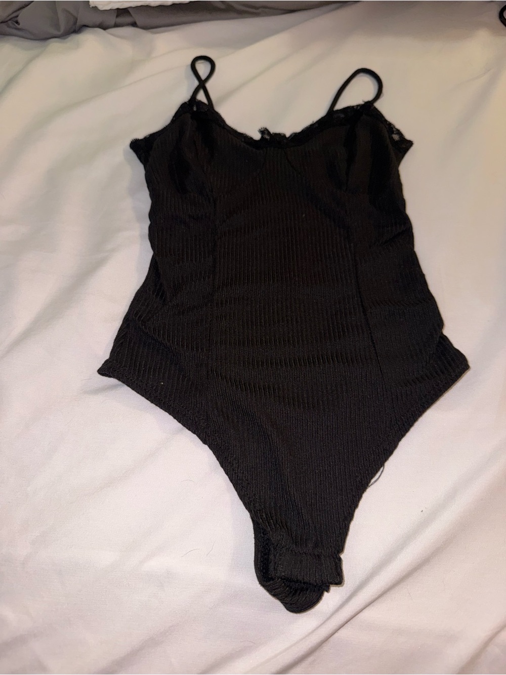 Women’s Black Ribbed One-Piece Bodysuit